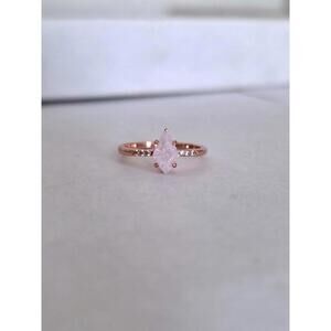 Rose Gold Ring with Marquise Cut Pink Stone and Accent Diamonds